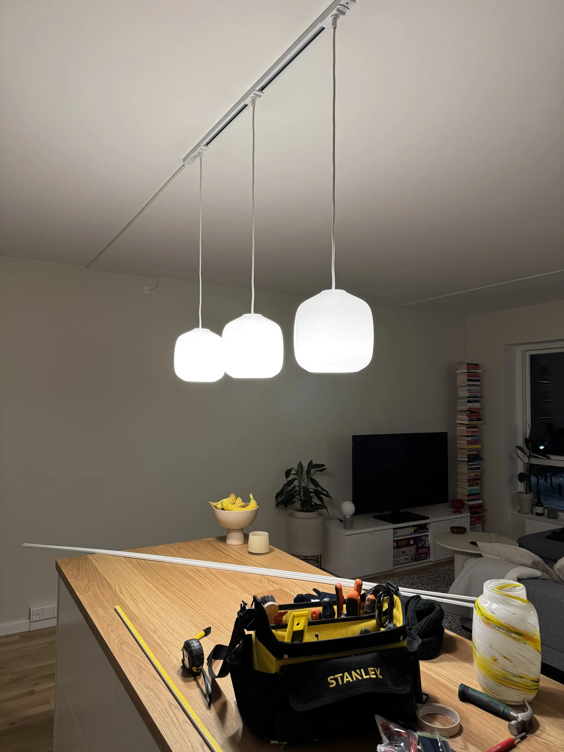 Pendant lamp hanging in place during a recent installation example in a Copenhagen apartment
