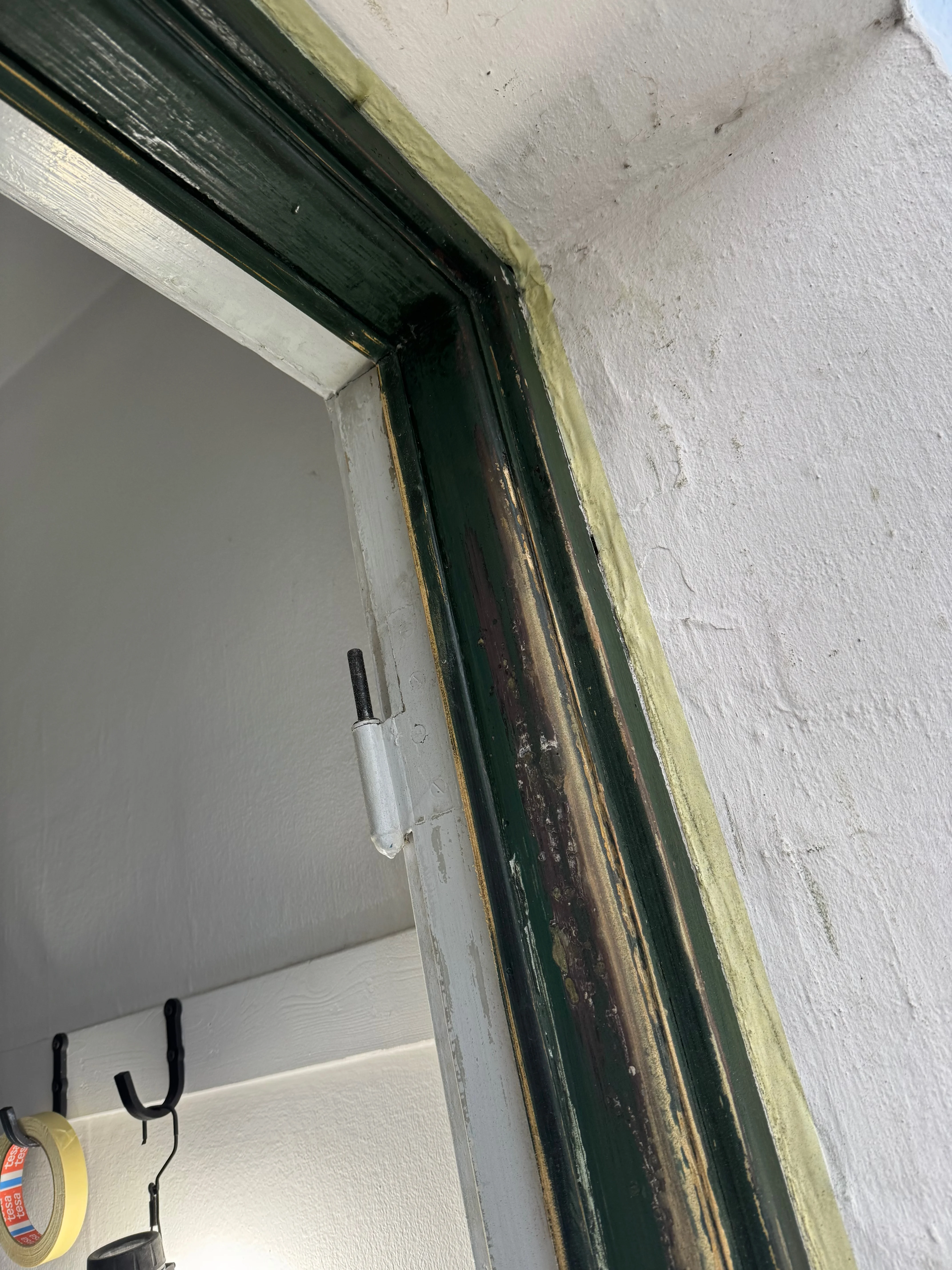 Final wide view of the restored door frame base