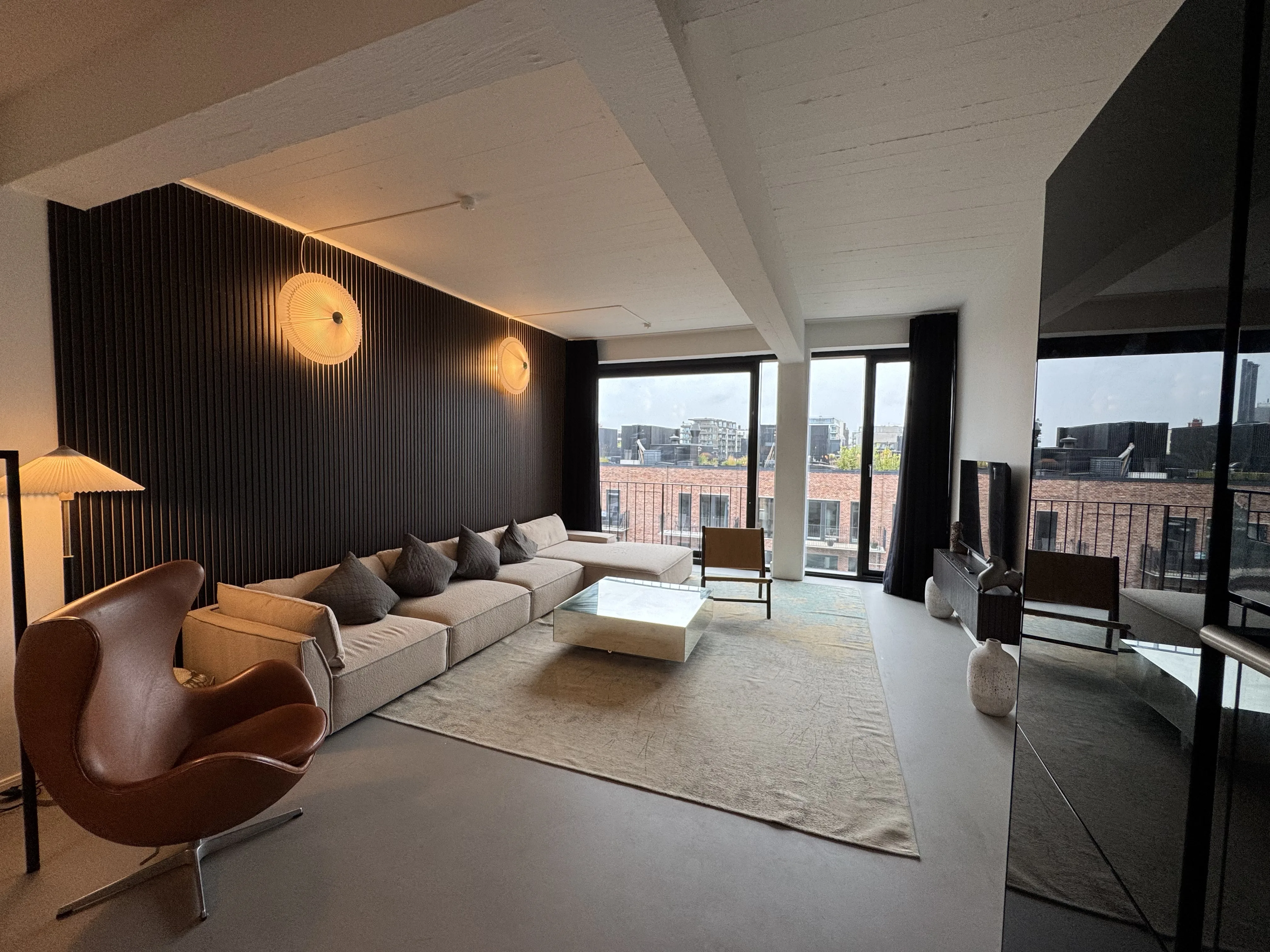 Guest-ready living room checked before handover in a Copenhagen rental apartment