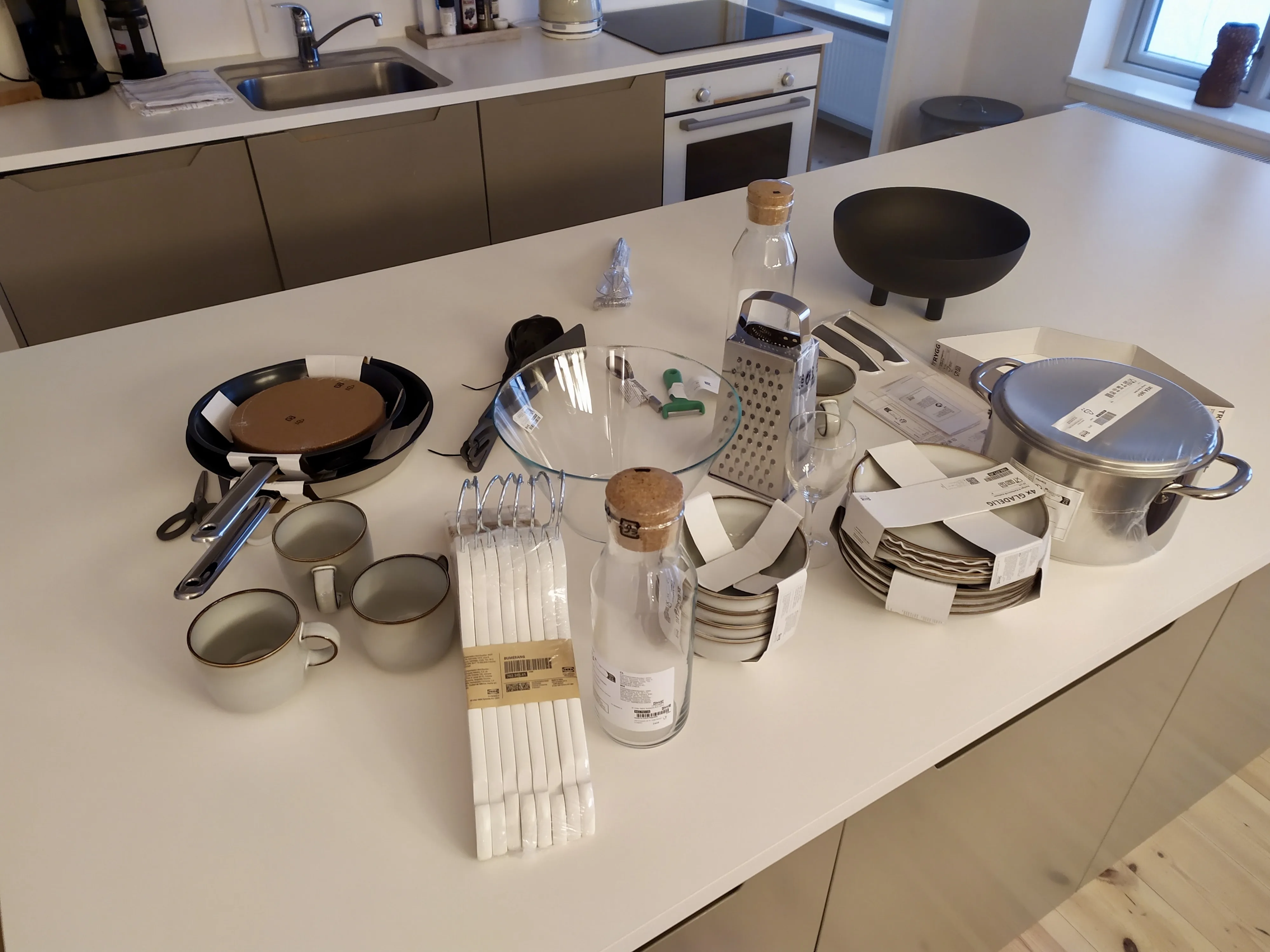 Kitchen inventory laid out for inspection in a Copenhagen rental apartment